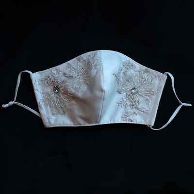 Hand embroidered re-usable, bridal face mask. Four layers of silk Mikado material with a white beaded embroidery