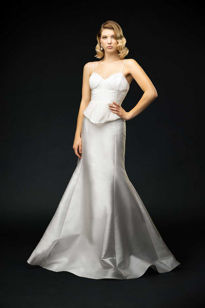 Silk mikado skirt with puddle train and jacquard swiss dot fitted peplum bodice wedding gown