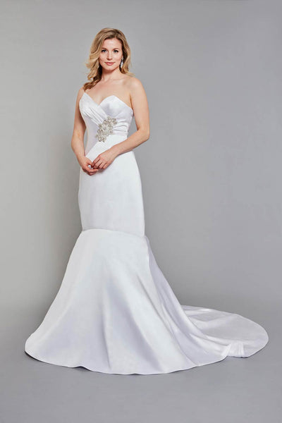 Bride wearing fitted sweetheart bodice, beaded with striking Swarovski crystals wedding gown